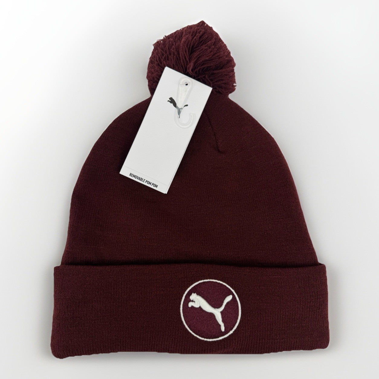 Puma WRMLBL Removable Pom Golf Beanie Ruby Shimmer One Size/ 329990