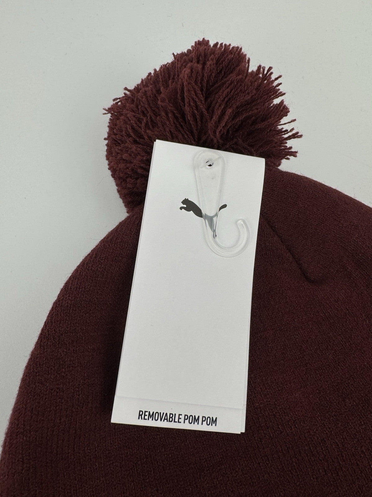 Puma WRMLBL Removable Pom Golf Beanie Ruby Shimmer One Size/ 329992
